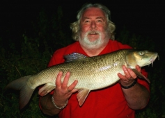 Bailiff Peter Tuke with a cracking 11lb 12oz barbel, caught on our stretch of the Avon using ledgered meat.